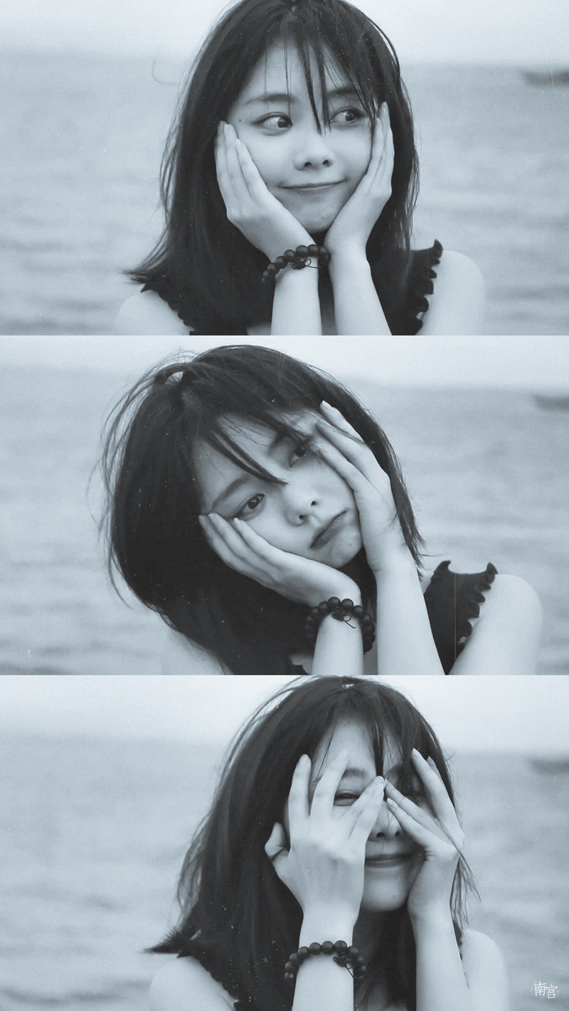 谭松韵笑容怼脸拍海边游客照