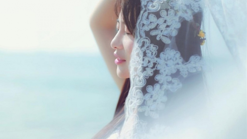 海边美女长发飘飘唯美动人写真