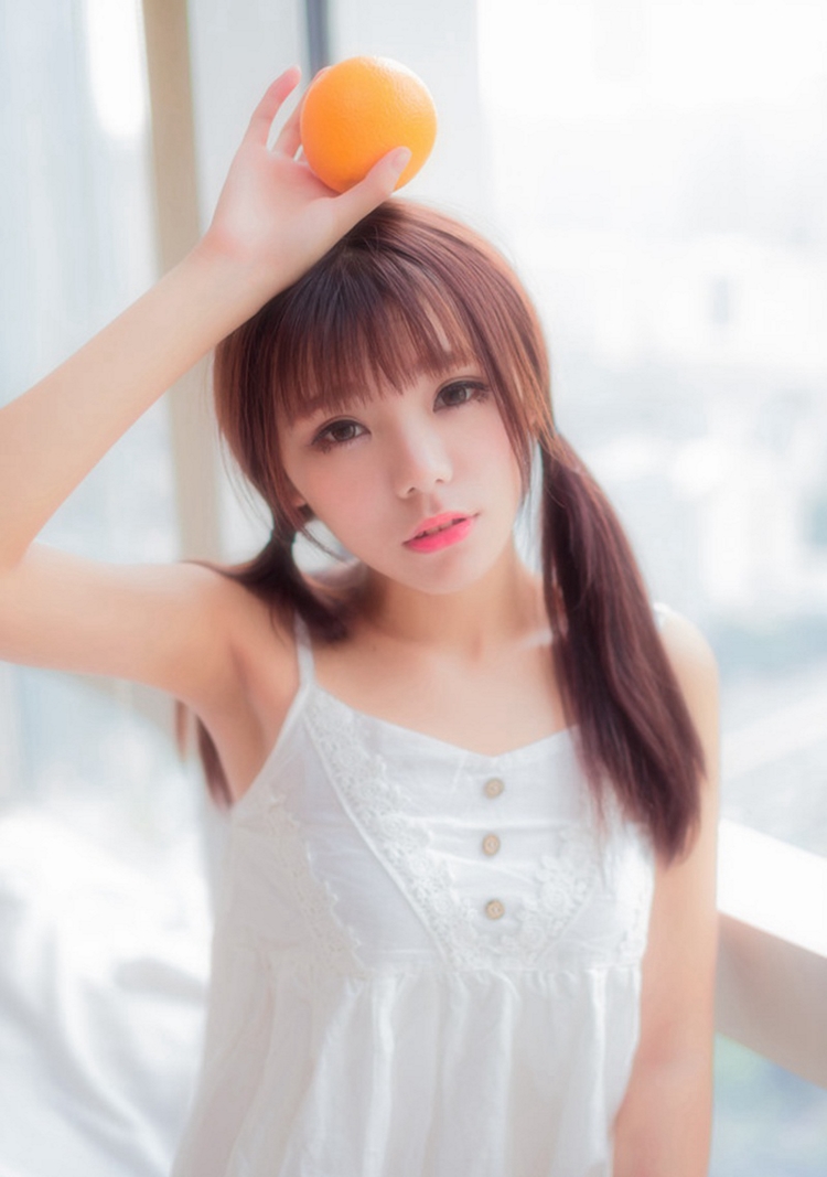 鲜橙少女甜美笑容化心房纯真唯美私房写真图片