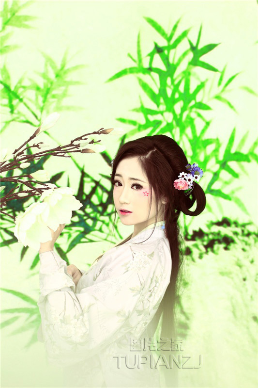 清秀少女古装写真图片 手持荷叶甜美怡人